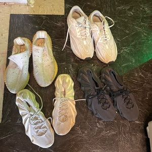 4 pair of Yeezys